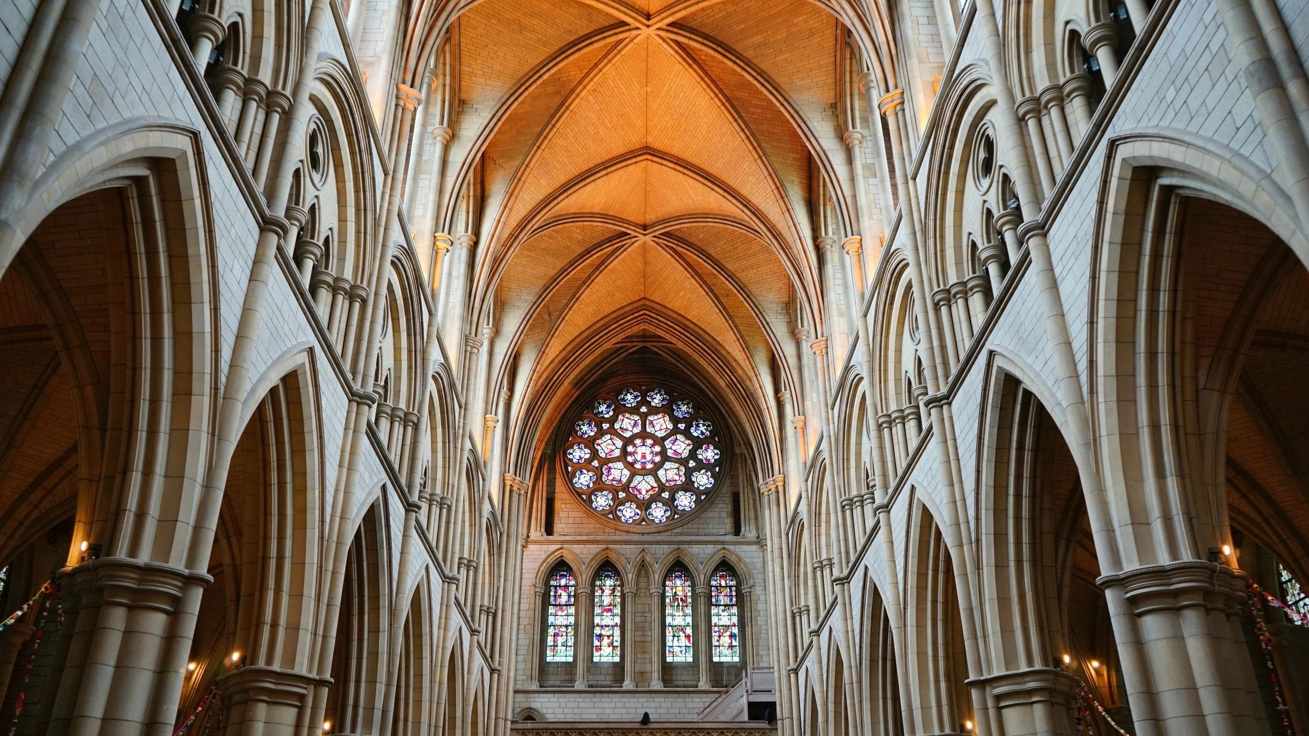 A cathedral with many arches and windows