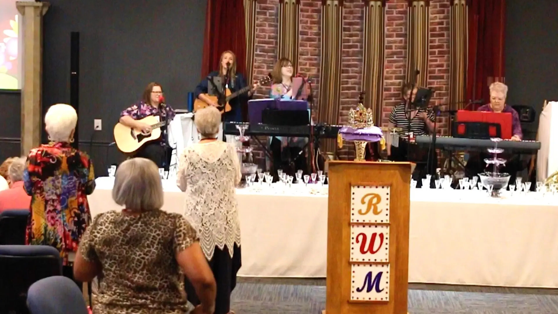 A group of people sitting at a table.